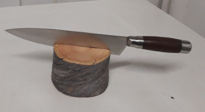 Shampanjamiekka puutukilla